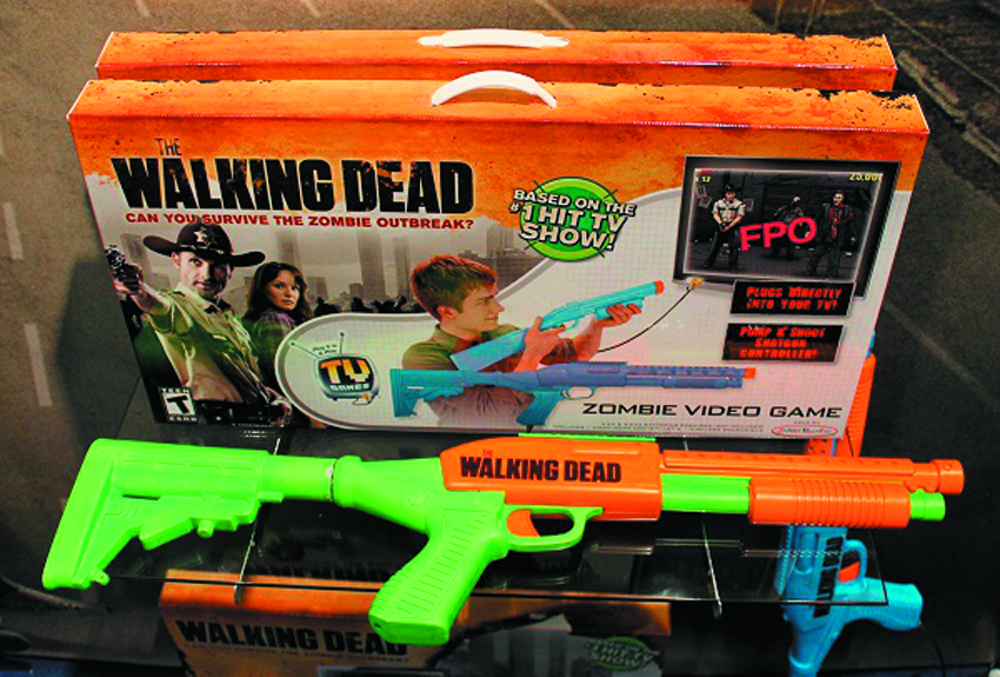 JUN121834 WALKING DEAD PLUGNPLAY TV GAME Previews World